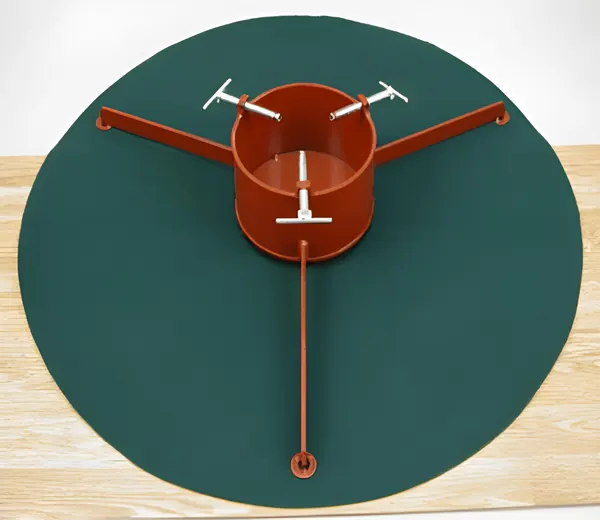 Stand sitting on the round green 48 inch tree mat